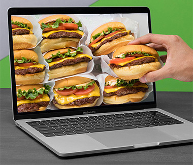 Hand Reaching in Screen for a ShackBurger