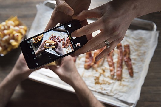 iPhone taking a picture of the Bacon CheddarShack