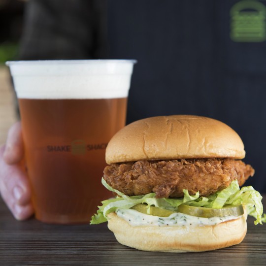 Chick'n Shack and ShackMeister Ale on a wooden table
