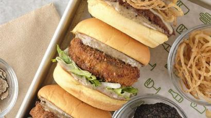 three burgers on a tray